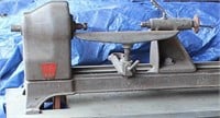 Duro wood lathe on stand, condition unknown