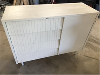 White Wooden Cabinet W/ Patterns And Material