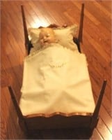 Doll bed w/ antique doll
