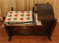Wooden doll cradle w/ bedding