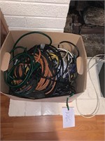 BOX OF CORDS AND EXTENSIONS CORDS