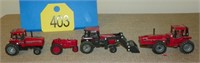 (4) 1/64th IH Tractors