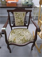 ANTIQUE WOOD FRAMED PADDED ARM CHAIR