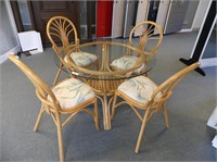 5 PC. RATTAN GLASSTOP TABLE W/CHAIRS