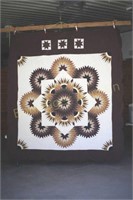 FEATHERED TWINKLING STAR QUILT