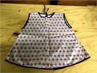 CHILD'S PURPLE  APRON W/ FLOWER DESIGN