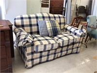 plaid love seat, some stains