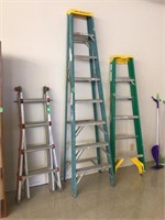 blue 8' step ladder, in middle