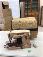singer sewing machine in roller bag