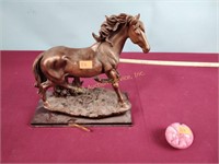 Saint Clair glass paperweight,  resin horse