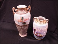 Two Nippon scenic handled vases: 7" and a 10",