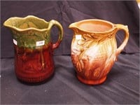 Two majolica serving pitchers, each 7 1/2" high: