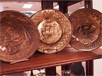 Three brass wall plaques, all 12" depicting