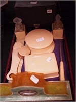 Collection of dresser cream celluloid items: