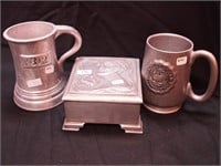 Three pieces of pewter: music box picturing a