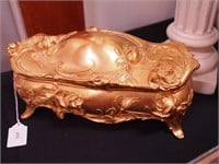 Highly polished  jewelry casket embossed with