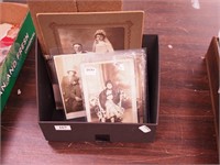 Vintage photographs and postcards including
