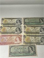 Canadian Bills(6-$1)(1-$2 Bills)7 Total