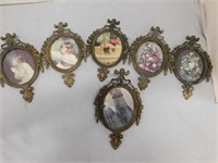 Six vintage brass Italian frames, one mirror,