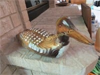 carved wood artist loon bird