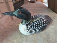 wood artist made carved loon bird