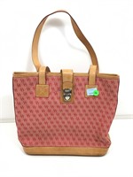 Dooney and Bourke footed shoulder bag with clasp.