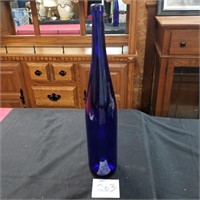 Tall blue bottle