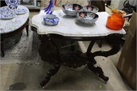 Walnut Victorian turtle top marble table with carv