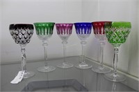 Six cut to clear crystal stemmed wine glasses in t