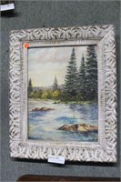 Oil on board of Northern Woods river scene signed