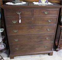 Two over four mahogany chest with brack feet and W