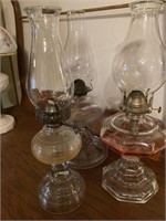 Three oil lamps