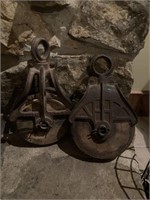 Two antique pulleys