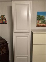 Two cabinets with two doors each