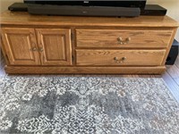 Oak TV stand, 5 feet wide by 22 inches deep by 2