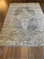 Area rug with pad