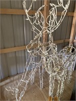 Two decorative lighted deer