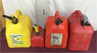 Three Gasoline Containers, One Diesel Fuel