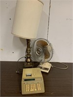 Lamp, fan, & adding machine