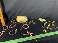 Assortment of Pins and Bracelets