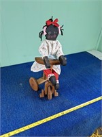 Doll on Tricycle