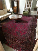 Larger oriental red rug