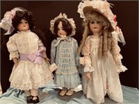 3 dressy dolls