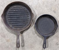 8"  Cracker Barrel cast iron pan and 11" Wagner's