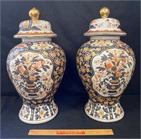 SUBSTANTIAL PAIR OF AMARI COVERED URNS WITH AGE