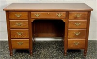Walnut Clore knee hole desk, drawer in center,