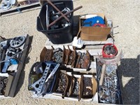 Pallet of hardware, nuts, bolts, clamps