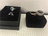 Lot of 4 rings.  Costume.  Blue is sterling. Size