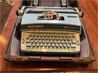 A Smith-Corona "Coronet Super 12" Type Writer