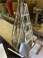 Barn scrapper, ladder, pitch fork